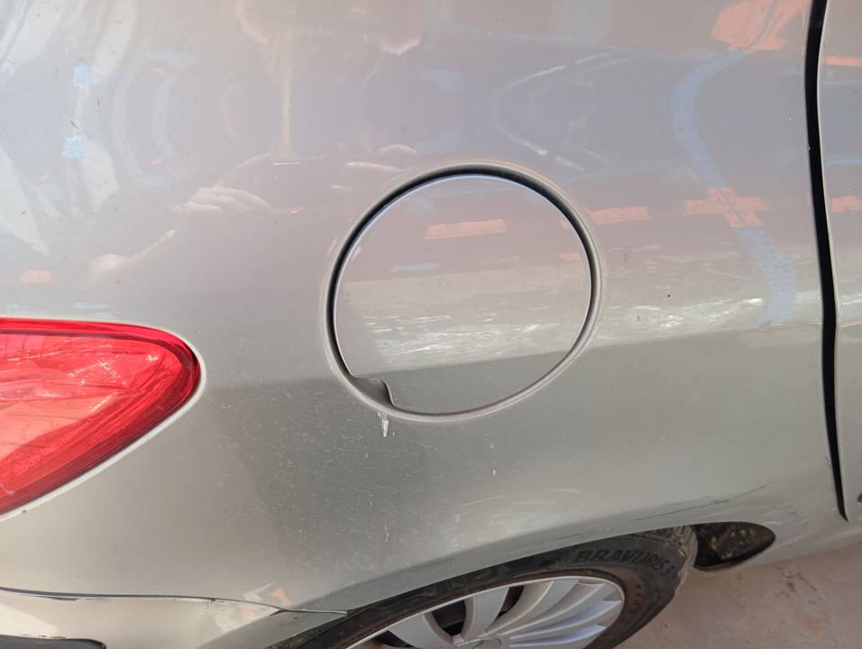 TAPA EXTERIOR COMBUSTIBLE