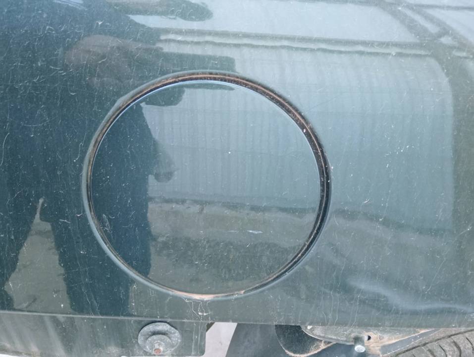 TAPA EXTERIOR COMBUSTIBLE