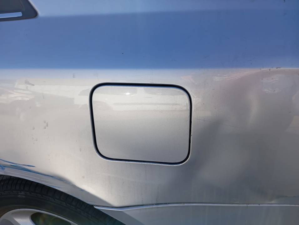 TAPA EXTERIOR COMBUSTIBLE