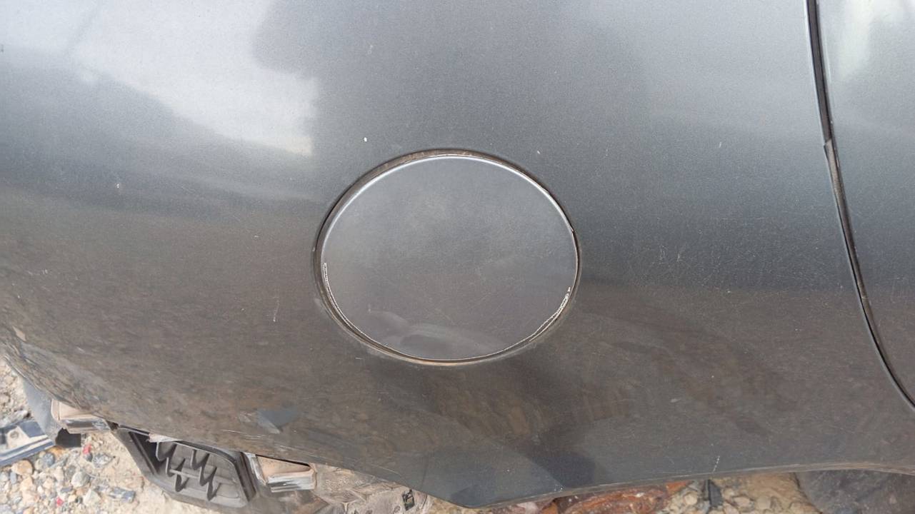 TAPA EXTERIOR COMBUSTIBLE