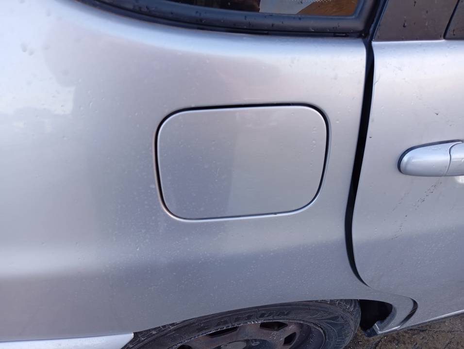 TAPA EXTERIOR COMBUSTIBLE