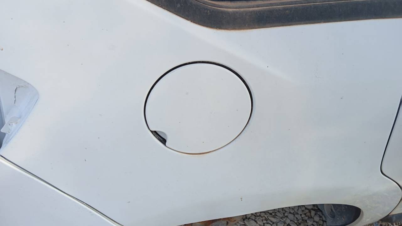 TAPA EXTERIOR COMBUSTIBLE