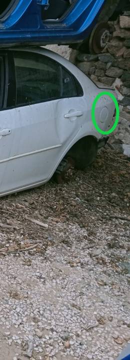 TAPA EXTERIOR COMBUSTIBLE