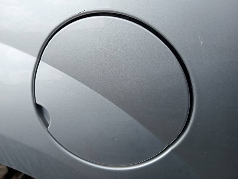 TAPA EXTERIOR COMBUSTIBLE