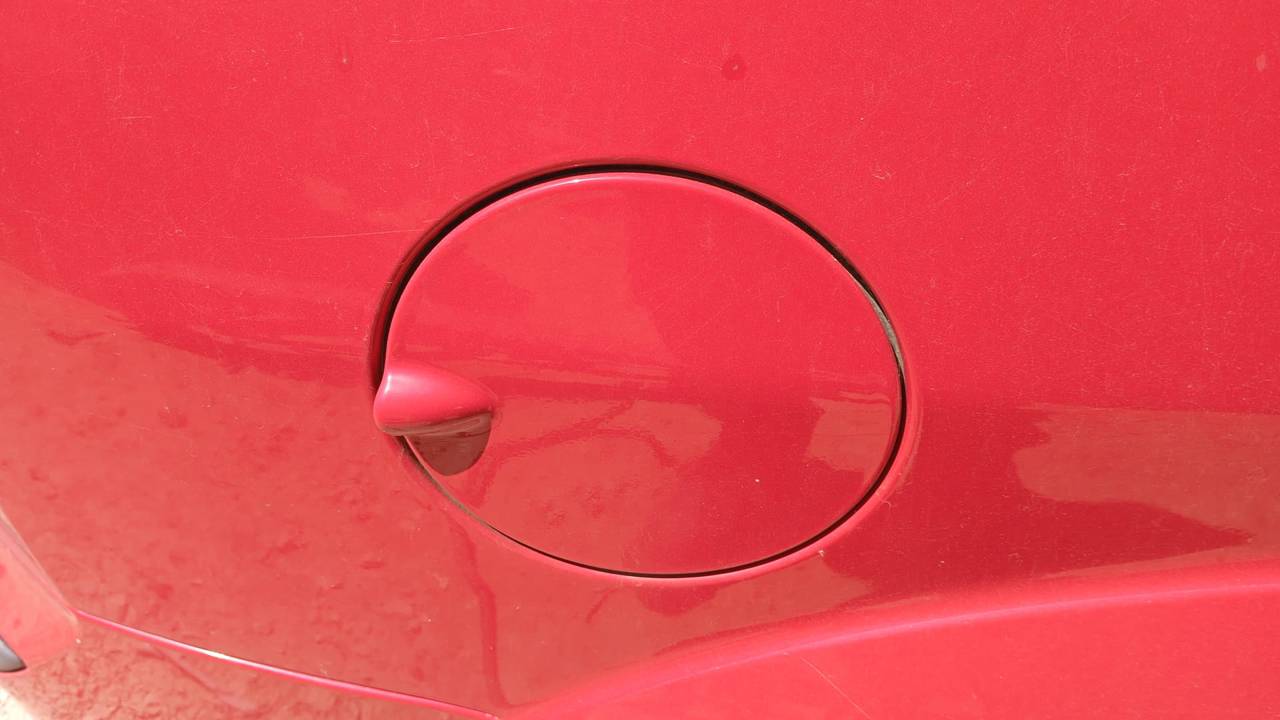 TAPA EXTERIOR COMBUSTIBLE