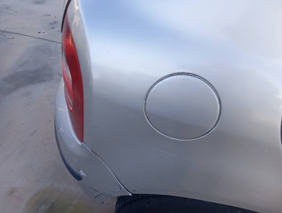 TAPA EXTERIOR COMBUSTIBLE