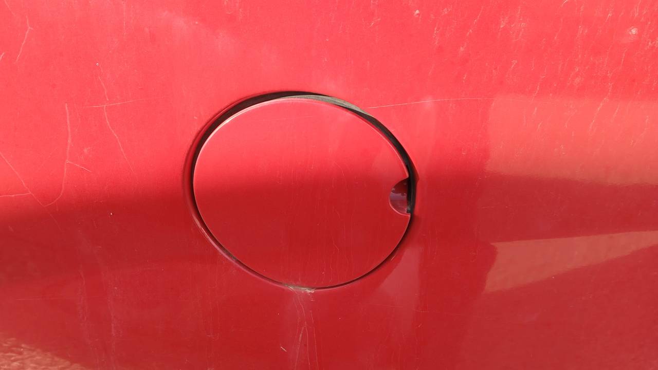 TAPA EXTERIOR COMBUSTIBLE