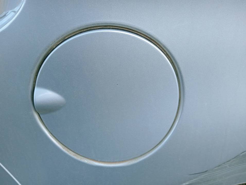 TAPA EXTERIOR COMBUSTIBLE