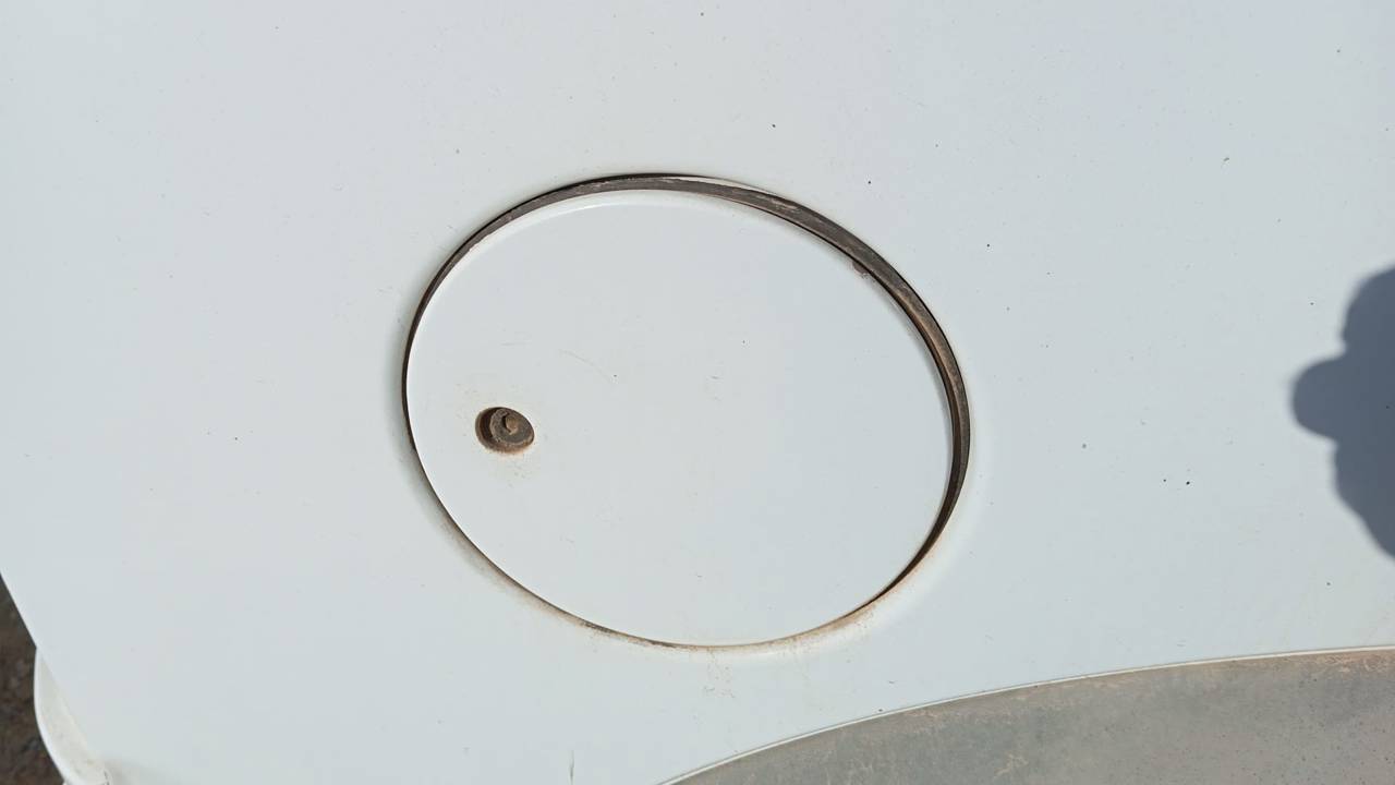 TAPA EXTERIOR COMBUSTIBLE