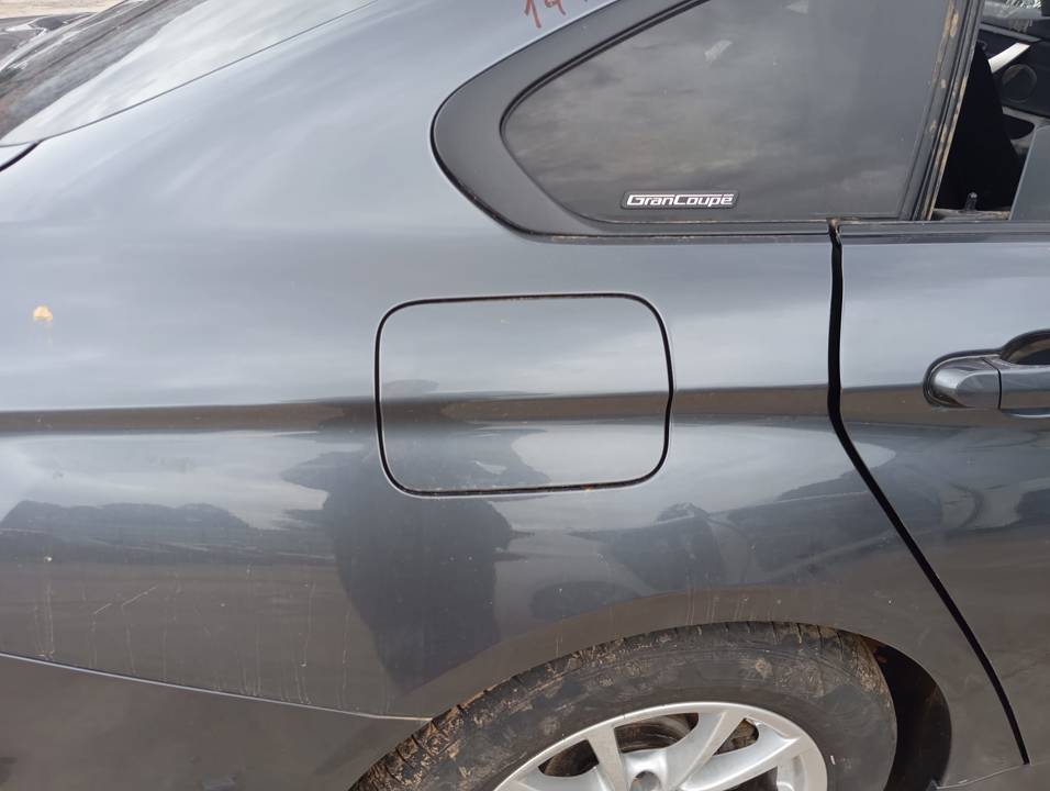 TAPA EXTERIOR COMBUSTIBLE