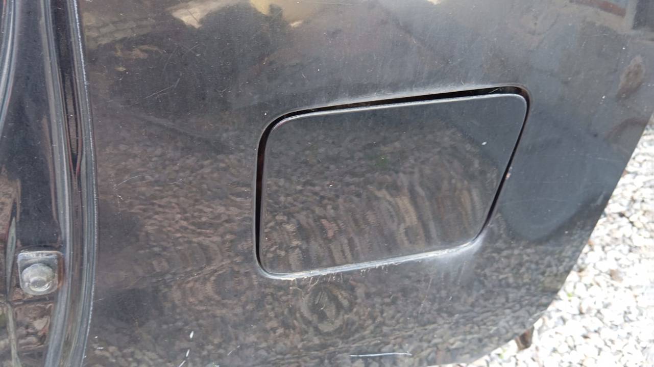 TAPA EXTERIOR COMBUSTIBLE