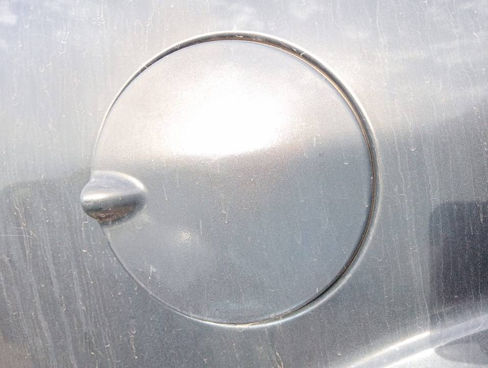 TAPA EXTERIOR COMBUSTIBLE