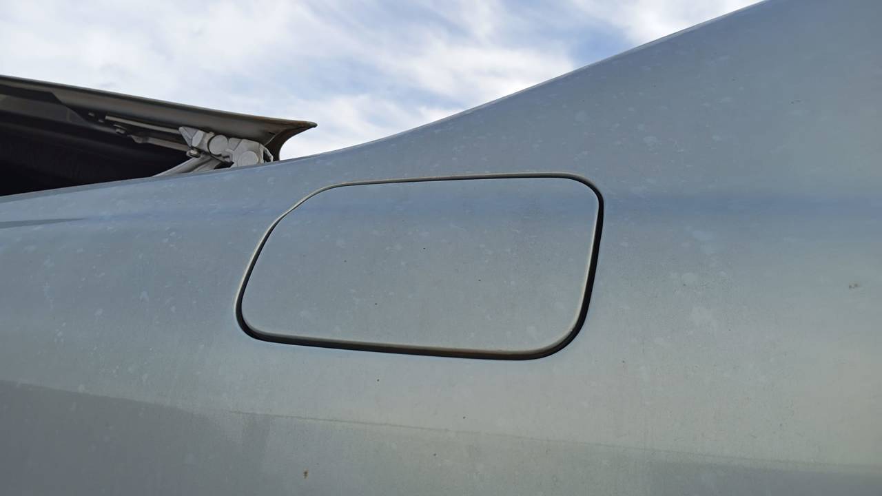TAPA EXTERIOR COMBUSTIBLE