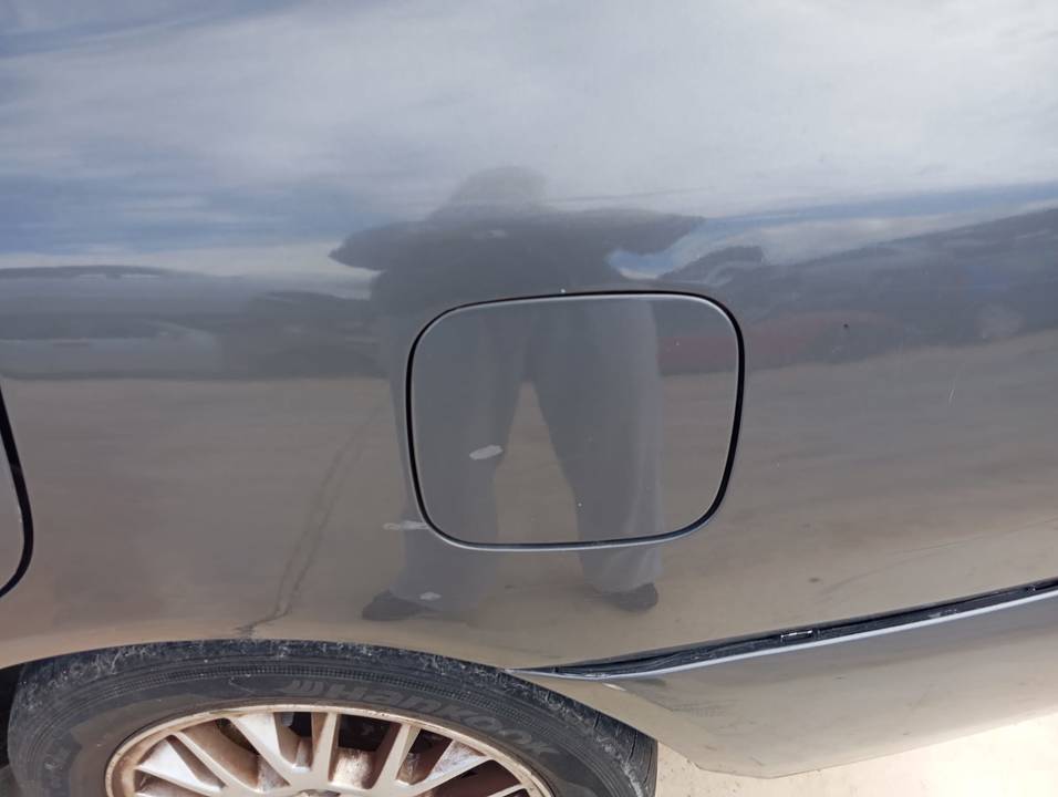 TAPA EXTERIOR COMBUSTIBLE