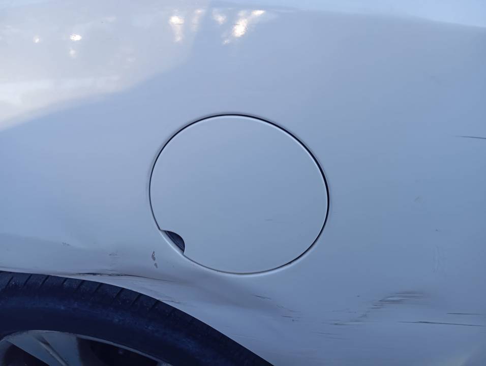 TAPA EXTERIOR COMBUSTIBLE
