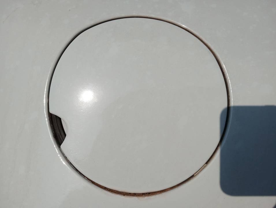 TAPA EXTERIOR COMBUSTIBLE