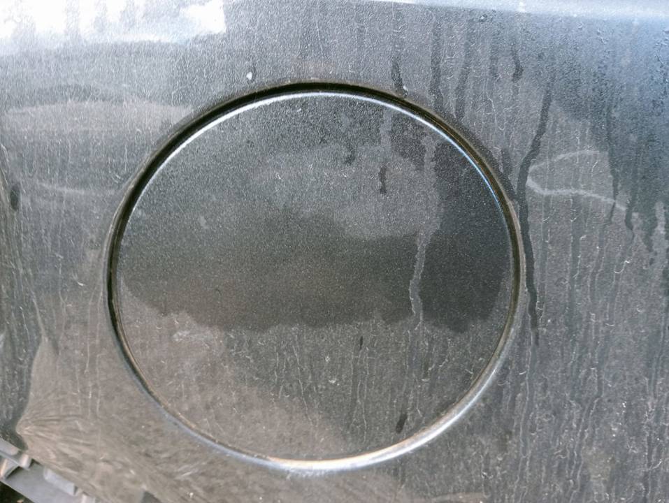 TAPA EXTERIOR COMBUSTIBLE