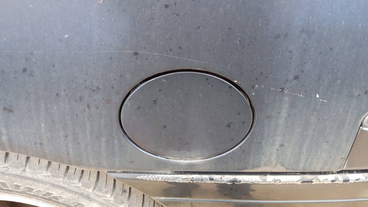 TAPA EXTERIOR COMBUSTIBLE
