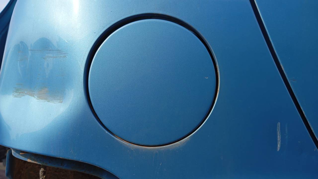 TAPA EXTERIOR COMBUSTIBLE