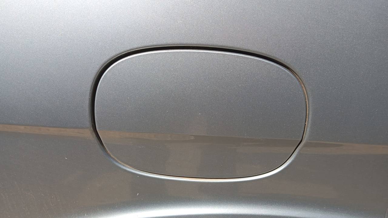 TAPA EXTERIOR COMBUSTIBLE