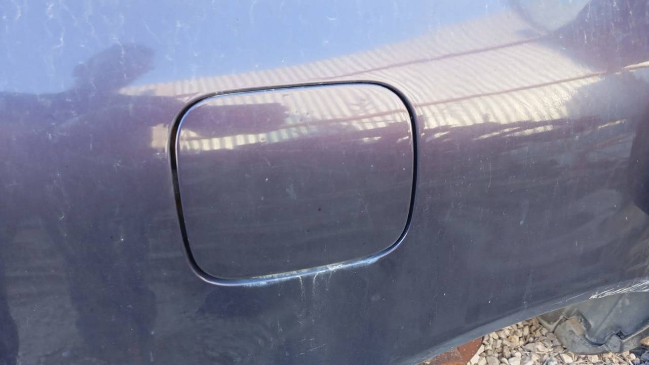 TAPA EXTERIOR COMBUSTIBLE