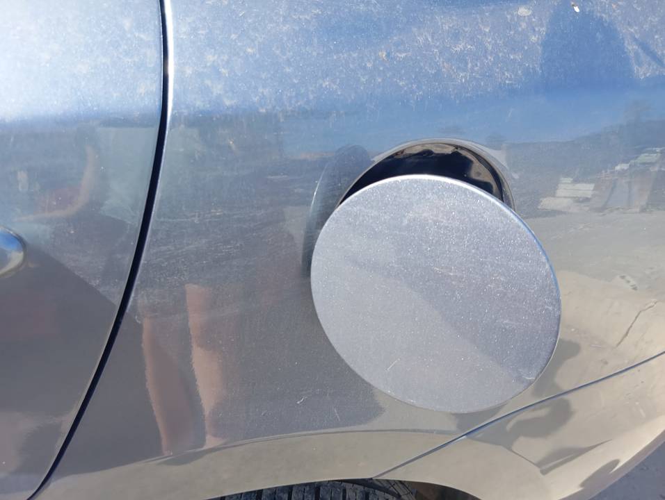 TAPA EXTERIOR COMBUSTIBLE