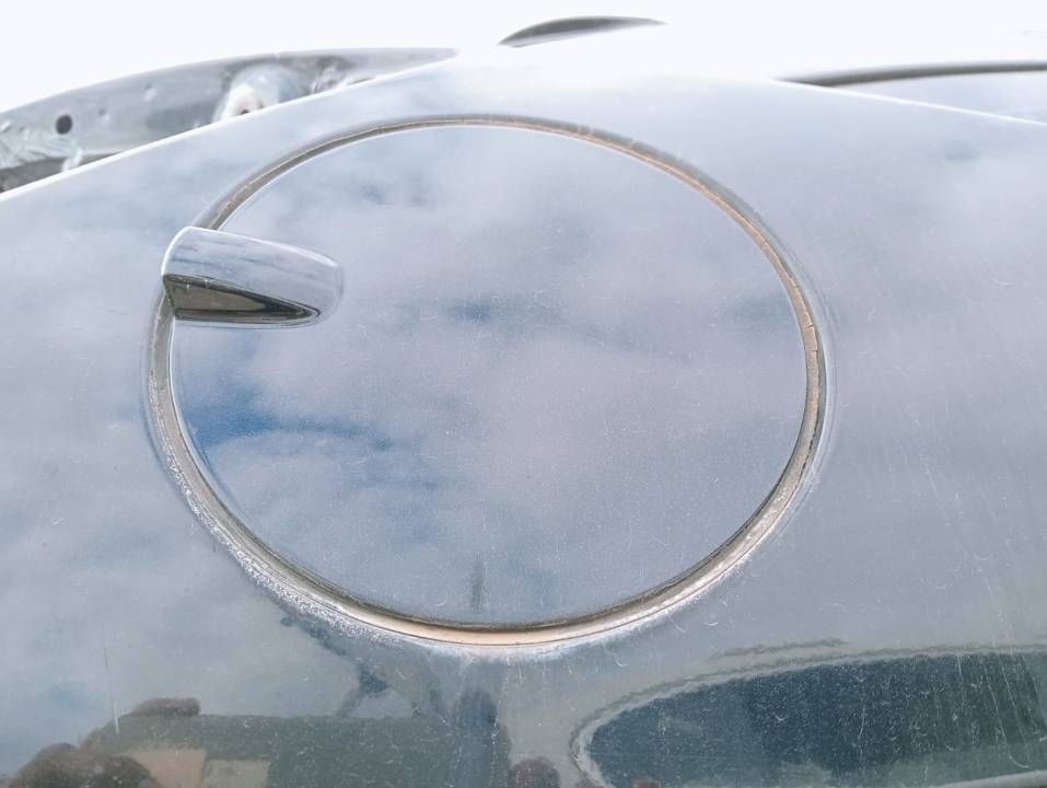 TAPA EXTERIOR COMBUSTIBLE