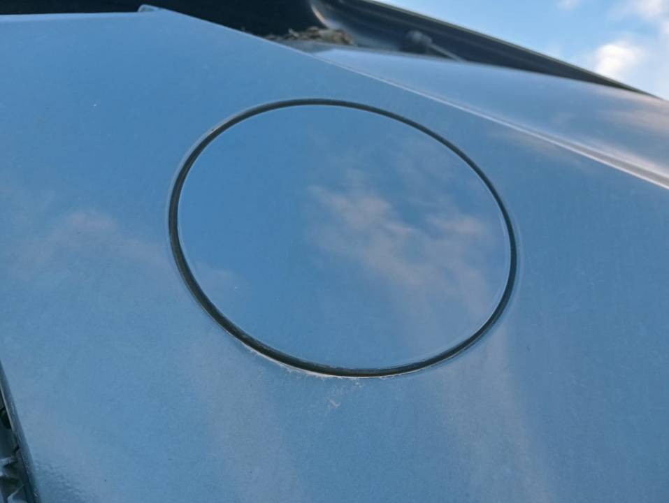 TAPA EXTERIOR COMBUSTIBLE