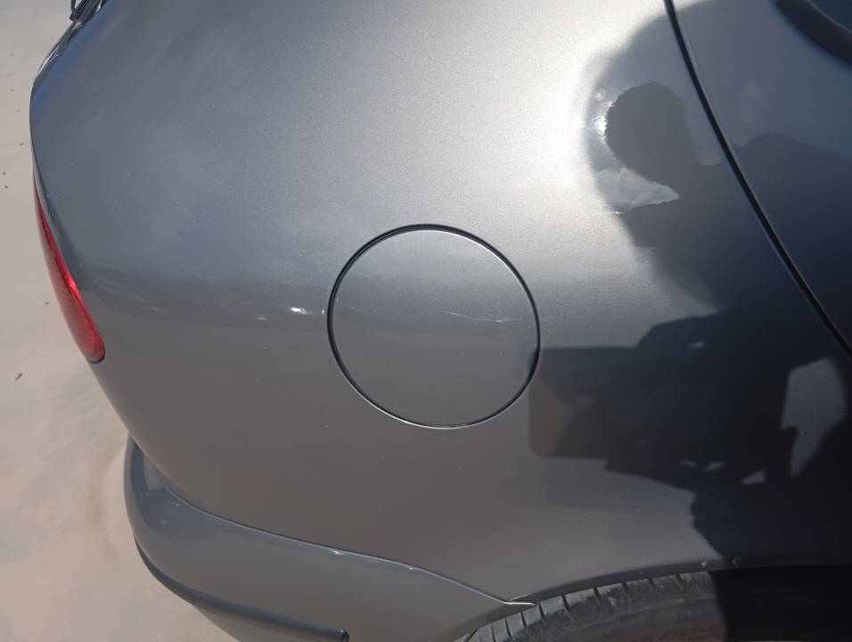 TAPA EXTERIOR COMBUSTIBLE