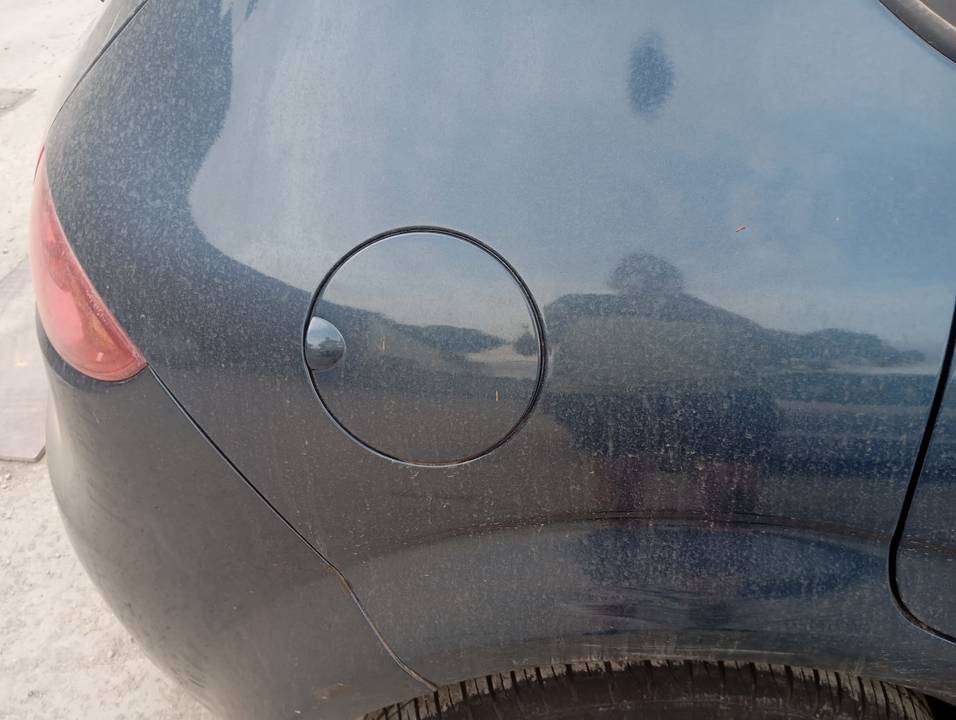 TAPA EXTERIOR COMBUSTIBLE