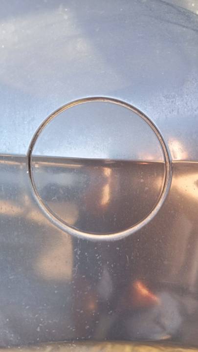 TAPA EXTERIOR COMBUSTIBLE