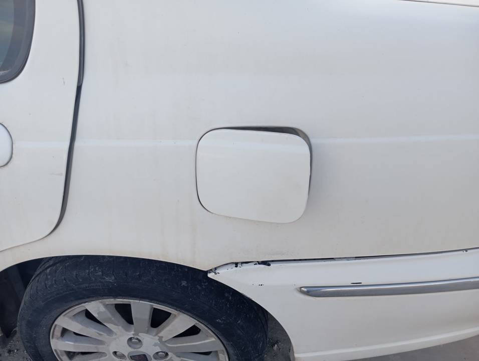 TAPA EXTERIOR COMBUSTIBLE