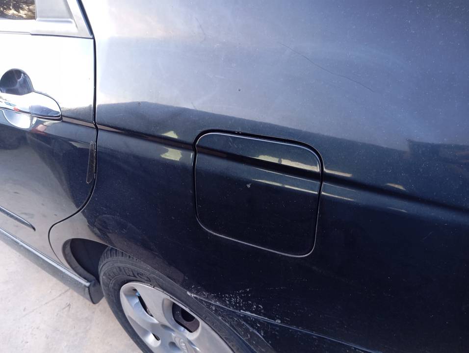 TAPA EXTERIOR COMBUSTIBLE