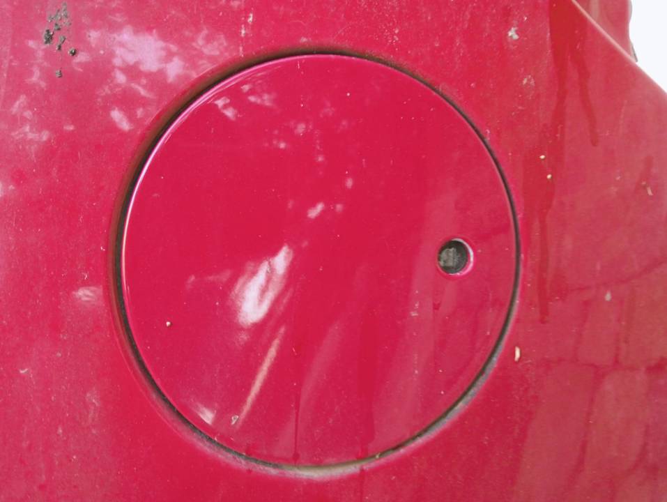 TAPA EXTERIOR COMBUSTIBLE
