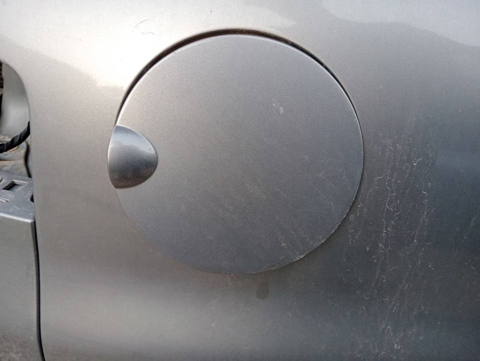 TAPA EXTERIOR COMBUSTIBLE