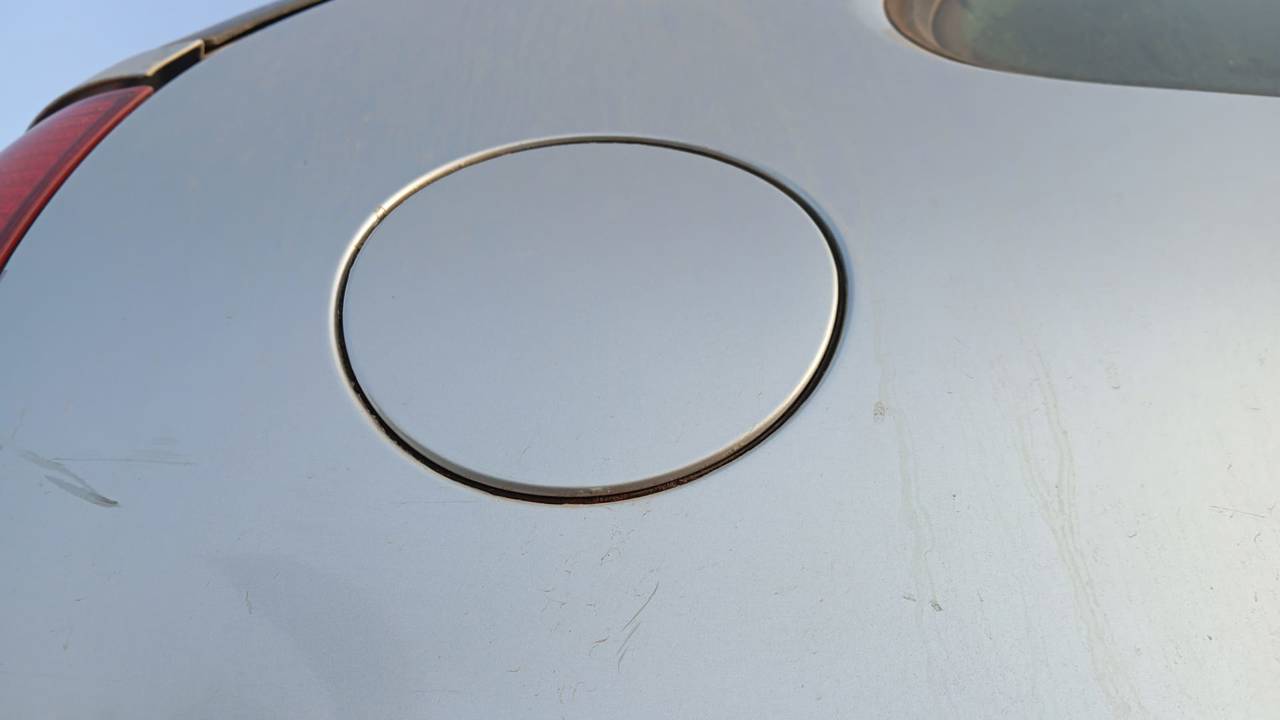 TAPA EXTERIOR COMBUSTIBLE