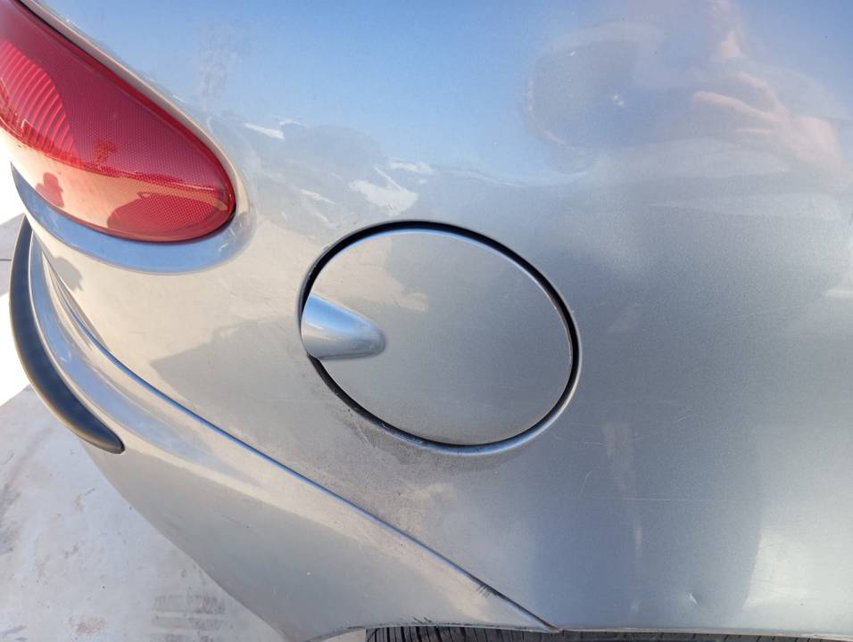 TAPA EXTERIOR COMBUSTIBLE