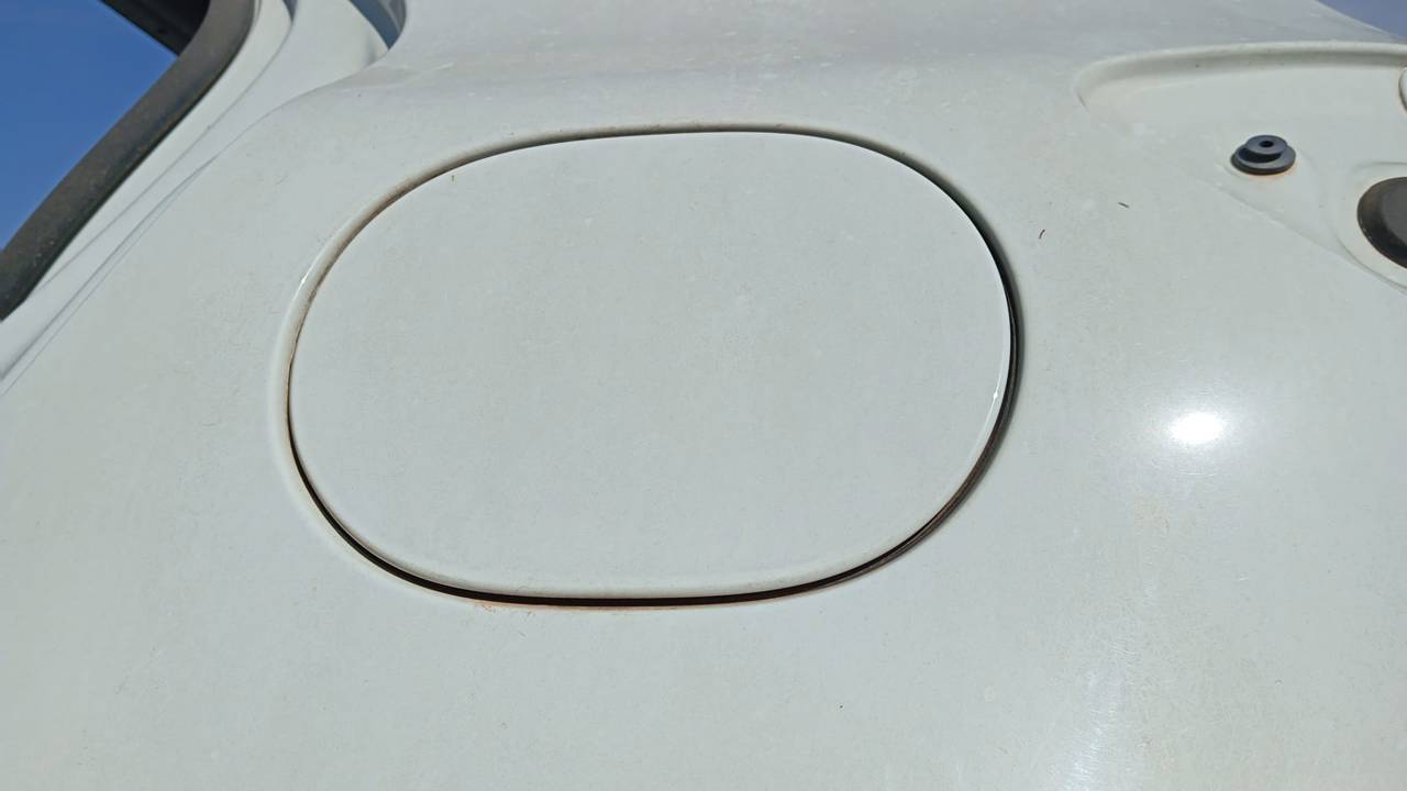 TAPA EXTERIOR COMBUSTIBLE