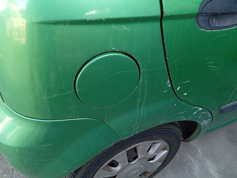TAPA EXTERIOR COMBUSTIBLE