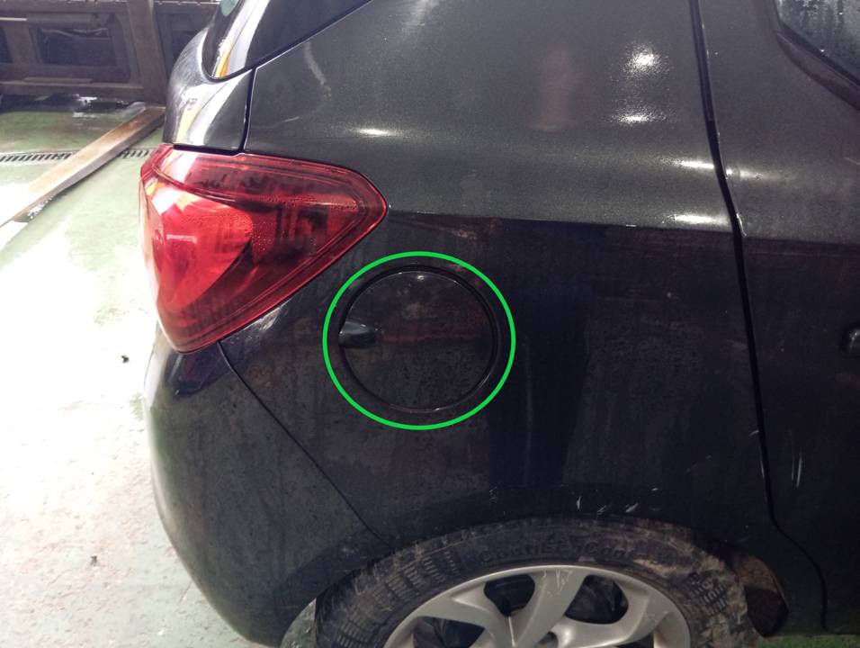 TAPA EXTERIOR COMBUSTIBLE