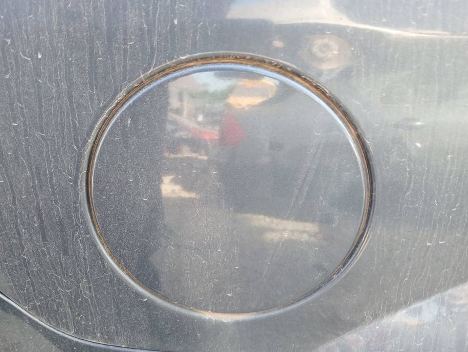 TAPA EXTERIOR COMBUSTIBLE