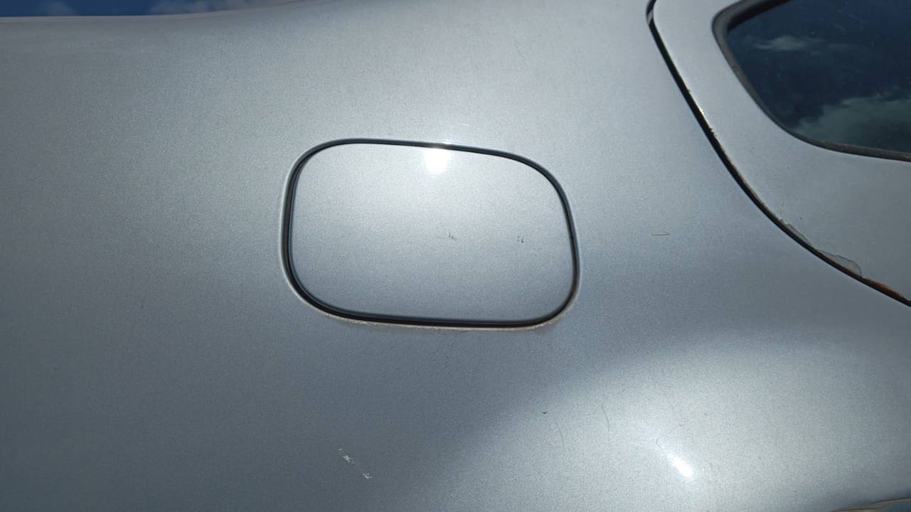 TAPA EXTERIOR COMBUSTIBLE