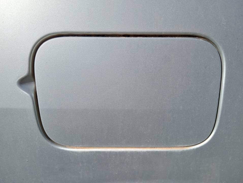 TAPA EXTERIOR COMBUSTIBLE