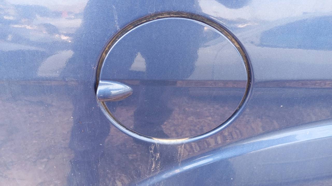 TAPA EXTERIOR COMBUSTIBLE