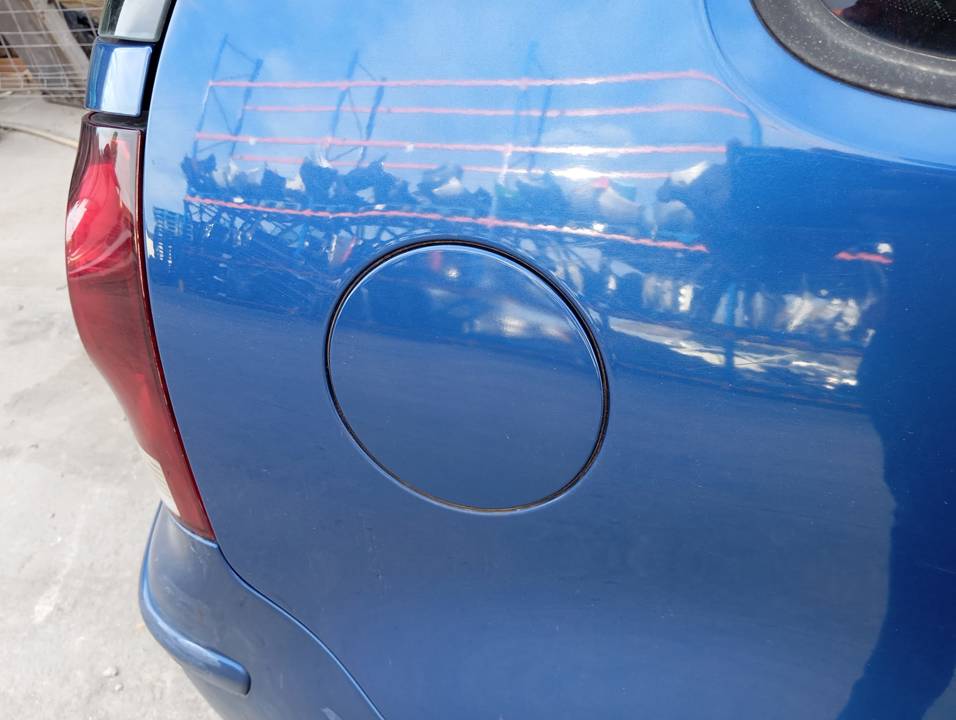 TAPA EXTERIOR COMBUSTIBLE