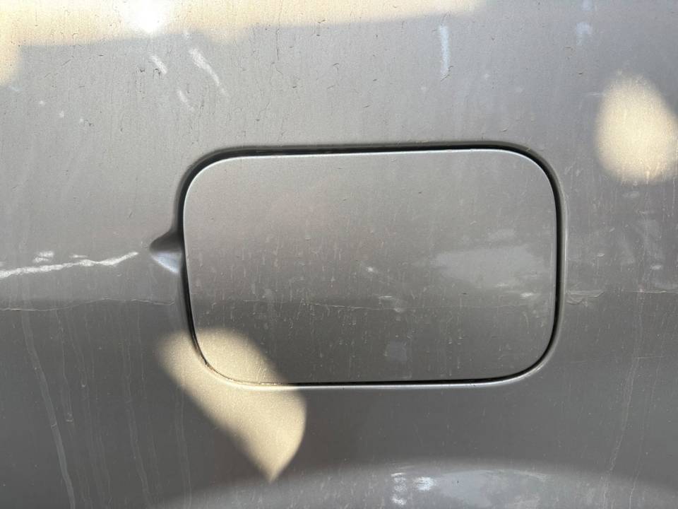 TAPA EXTERIOR COMBUSTIBLE