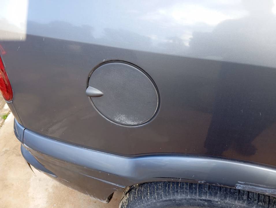 TAPA EXTERIOR COMBUSTIBLE