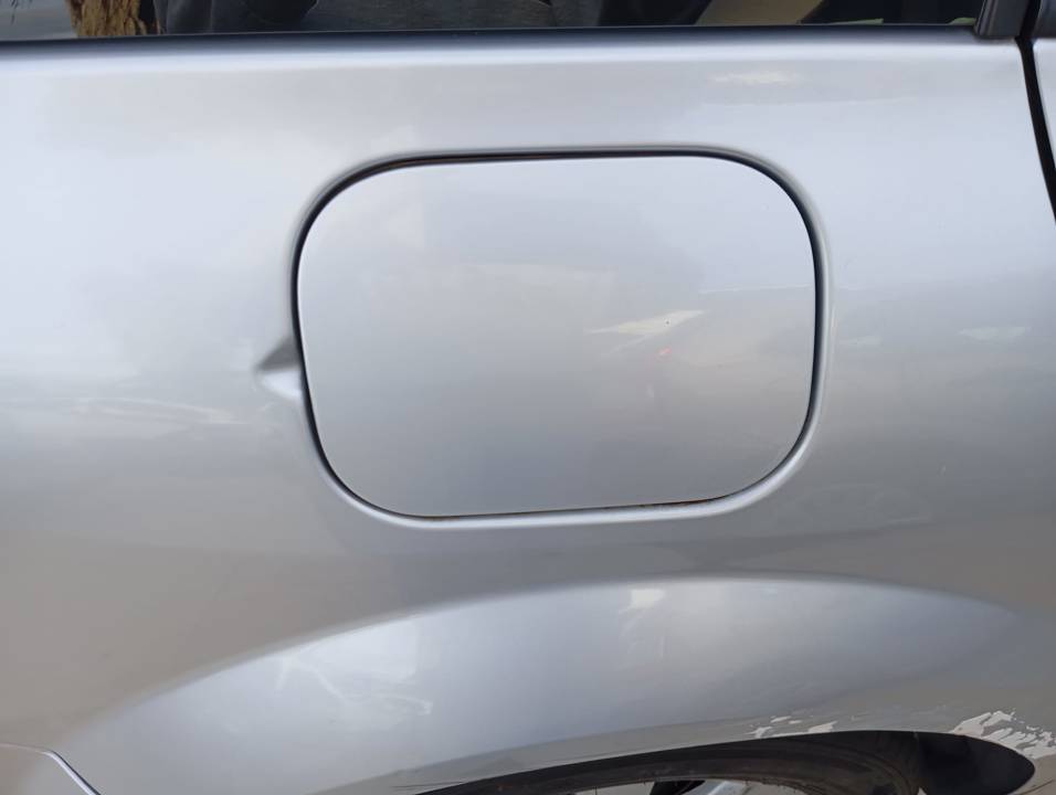 TAPA EXTERIOR COMBUSTIBLE