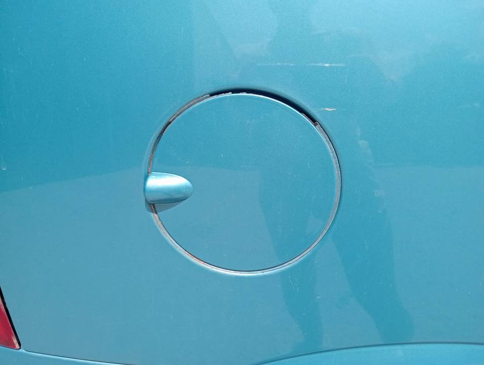 TAPA EXTERIOR COMBUSTIBLE