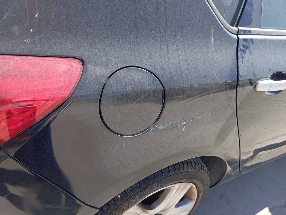 TAPA EXTERIOR COMBUSTIBLE
